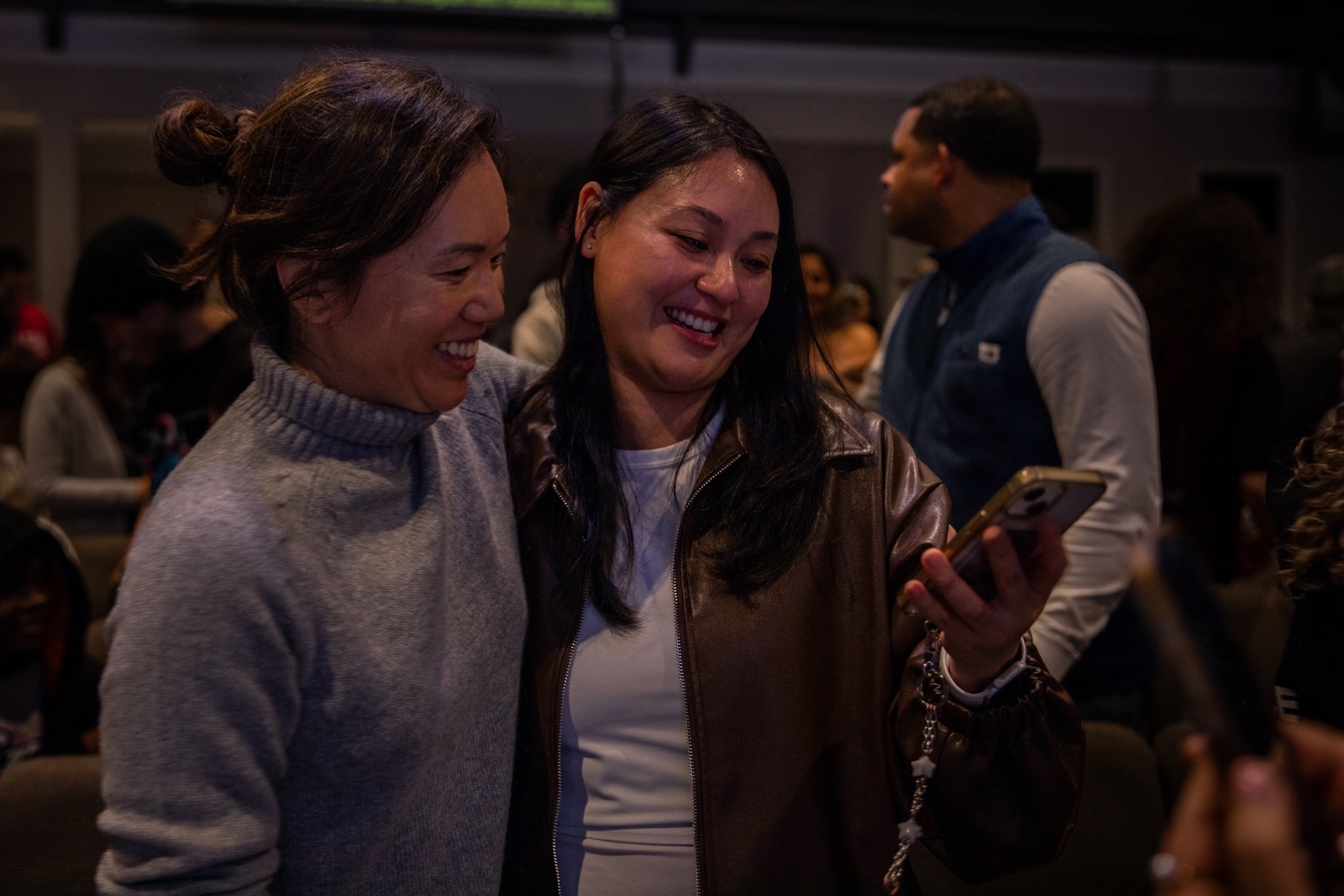Two women sharing a smile together at Lineage